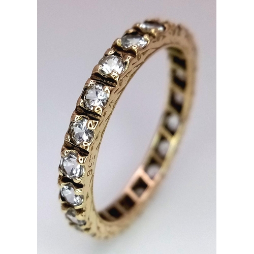 1515 - A 9k Yellow Gold (tested as) CZ Full ET Ring, 2.5g total weight, size R.

ref: 1669I