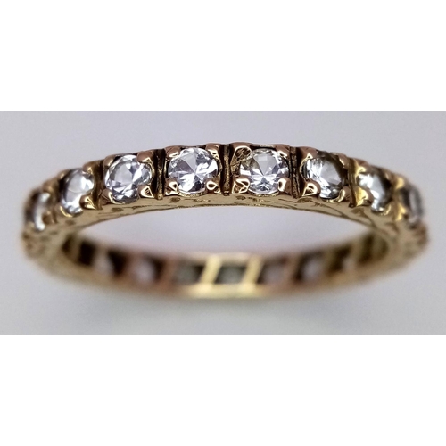 1515 - A 9k Yellow Gold (tested as) CZ Full ET Ring, 2.5g total weight, size R.

ref: 1669I