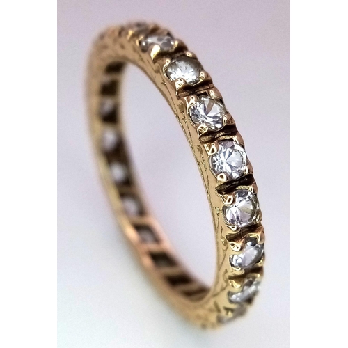 1515 - A 9k Yellow Gold (tested as) CZ Full ET Ring, 2.5g total weight, size R.

ref: 1669I