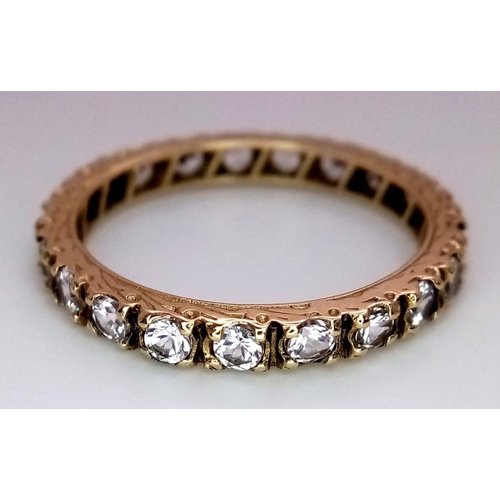 1515 - A 9k Yellow Gold (tested as) CZ Full ET Ring, 2.5g total weight, size R.

ref: 1669I