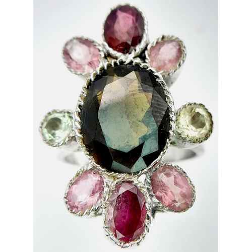 1371 - A Vintage Sterling Silver Multi-Gemstone Set Ring Size Q. The ring is set with a centre 1.4cm Long O... 