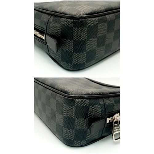 633 - A Louis Vuitton Damier Graphite Toiletry Pouch. Coated canvas exterior with silver-toned hardware an... 