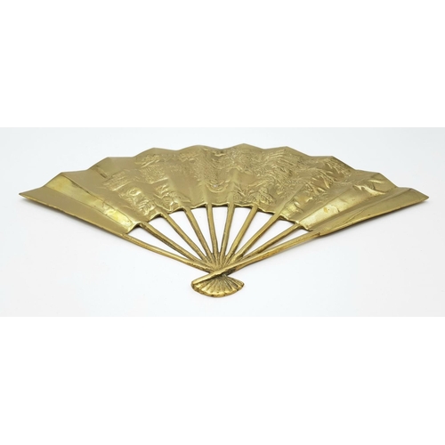 1230 - A Vintage Asian Brass Wall Hanging Fan. 28cm fan-span. 19037