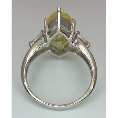 1021 - A STERLING SILVER THREE STONE COCKTAIL RING. 7G. SIZE P 1/2. SC5076