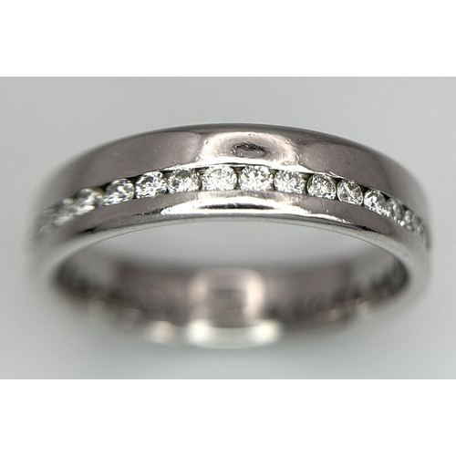 109 - A STYLISH PLATINUM DIAMOND FULL ETERNITY RING. 8.6G. SIZE Q. SC5043.