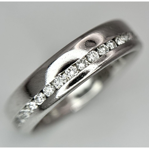 109 - A STYLISH PLATINUM DIAMOND FULL ETERNITY RING. 8.6G. SIZE Q. SC5043.