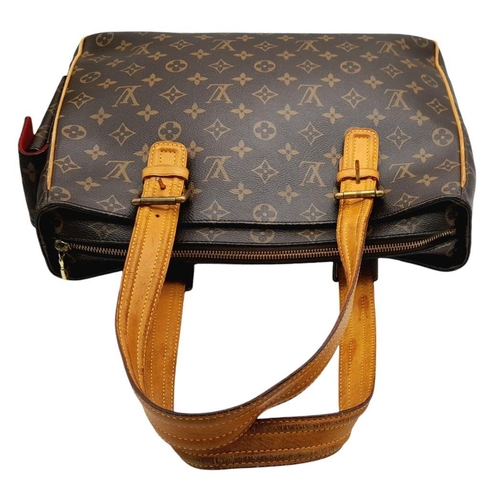 129 - A Louis Vuitton Viva Cite Large Shoulder Bag. Coated LV canvas exterior with two large pockets. Brow... 