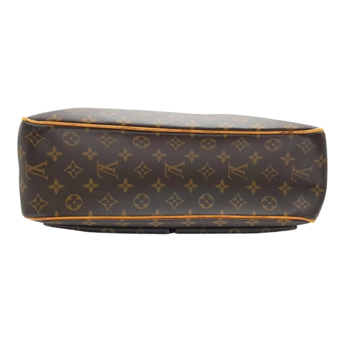 129 - A Louis Vuitton Viva Cite Large Shoulder Bag. Coated LV canvas exterior with two large pockets. Brow... 