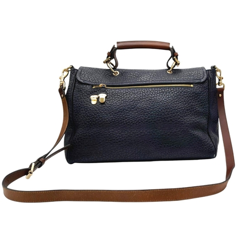 143 - A Mulberry Polly Pushlock Satchel in Blue Leather Textured blue leather exterior. Gold tone hardware... 