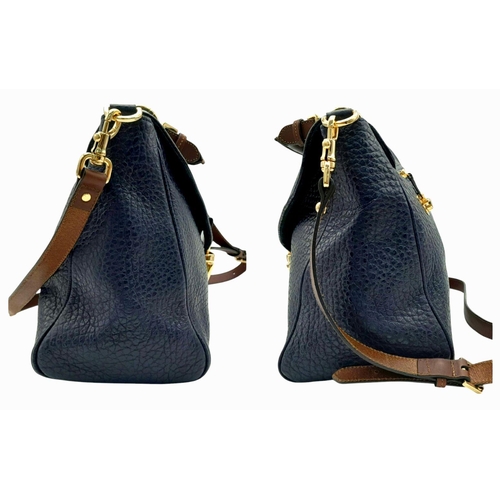 143 - A Mulberry Polly Pushlock Satchel in Blue Leather Textured blue leather exterior. Gold tone hardware... 