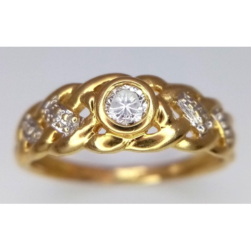 186 - AN 18K YELLOW GOLD WOVEN DIAMOND SET RING. 2.7G. SIZE M 1/2. SC5061