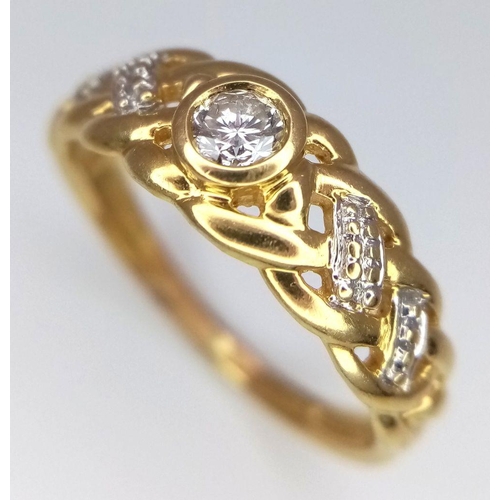 186 - AN 18K YELLOW GOLD WOVEN DIAMOND SET RING. 2.7G. SIZE M 1/2. SC5061