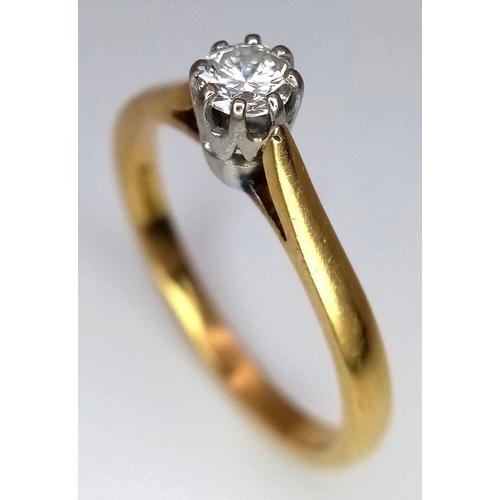 200 - AN 18K YELLOW GOLD DIAMOND SET SOLITAIRE RING. 0.15CT. 2.5G. SIZE M. 8865