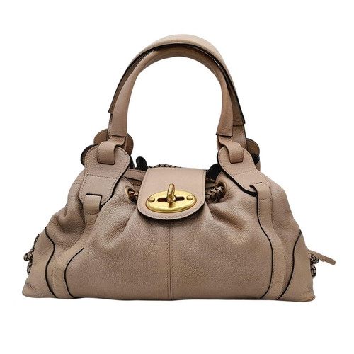 206 - A Mulberry Beige Leather Handbag. Leather exterior with brass-toned hardware and drawstring closure.... 