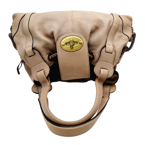 206 - A Mulberry Beige Leather Handbag. Leather exterior with brass-toned hardware and drawstring closure.... 