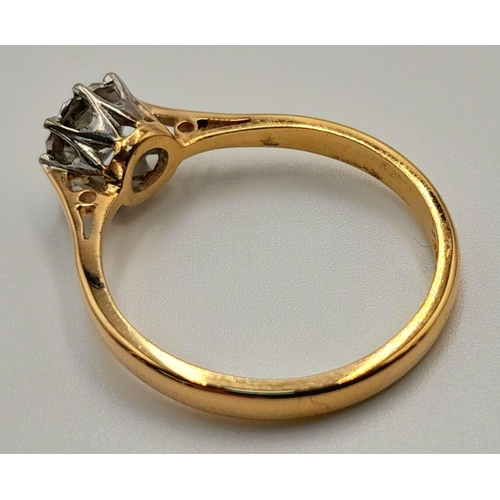 207 - AN 18K YELLOW GOLD AND DIAMOND SET SOLITAIRE RING. 2.5G. SIZE M. 8866