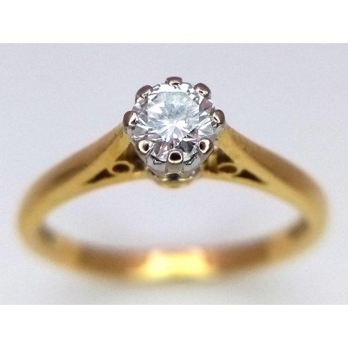 214 - AN 18K YELLOW GOLD DIAMOND SET SOLITAIRE RING. 0.15CT. 2.3G. SIZE K. 8867