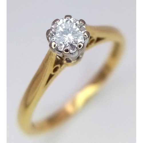 214 - AN 18K YELLOW GOLD DIAMOND SET SOLITAIRE RING. 0.15CT. 2.3G. SIZE K. 8867