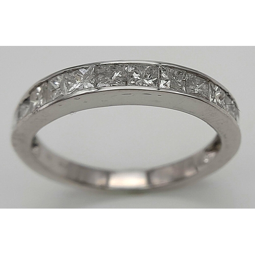 272 - A 9K WHITE GOLD DIAMOND SET HALF ETERNITY RING. PRINCESS CUTS. APPROX 1CTW. 2.4G. SIZE L. SC5046