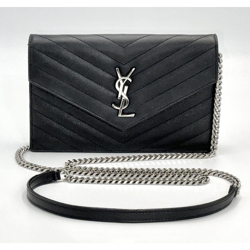 32 - YSL Crossbody Bag. In good condition but please see photos.