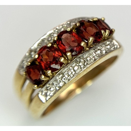 321 - A 9K YELLOW GOLD, DIAMOND AND GARNET SET RING. 4G SIZE M. SC5069