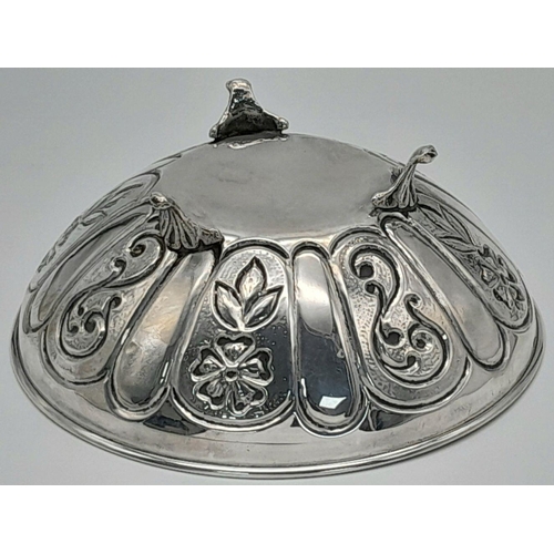 366 - A Vintage 925 Sterling Silver Chased Decorative Dish. On three pedestal feet. 13cm diameter. 72g