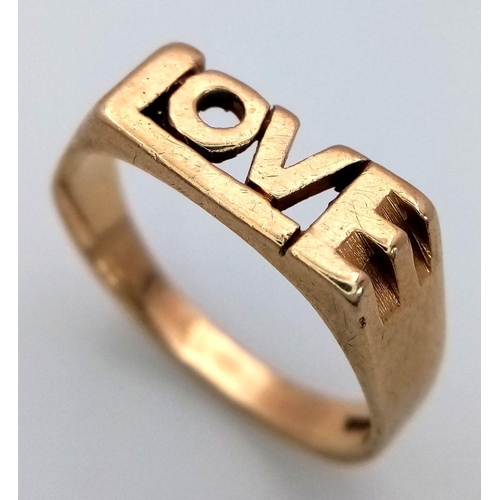 425 - A 9K YELLOW GOLD 'LOVE' RING. 3.5G. SIZE Q. SC5033