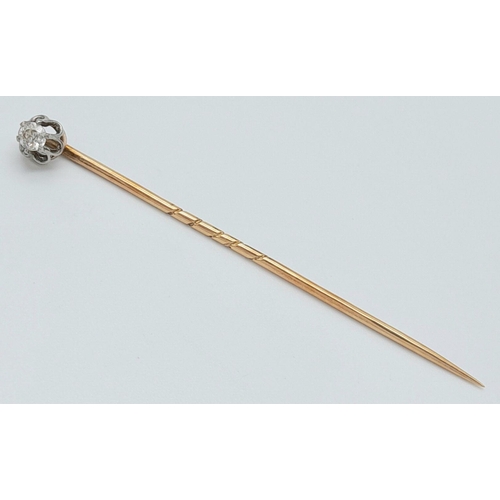 43 - An Antique 9K Gold Diamond Stick Pin. 0.15ct diamond. 6cm. 1.3g total weight. Comes in original case... 