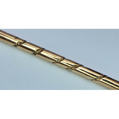 43 - An Antique 9K Gold Diamond Stick Pin. 0.15ct diamond. 6cm. 1.3g total weight. Comes in original case... 