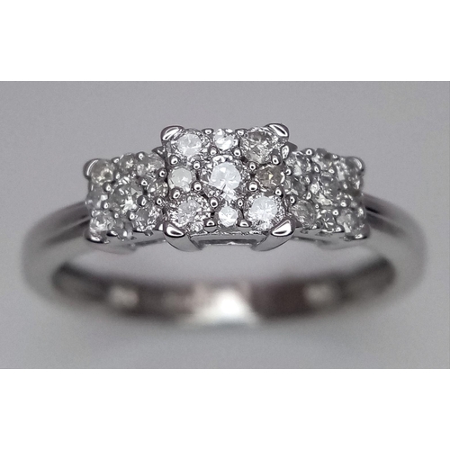 467 - A 9K WHITE GOLD TRIPLE SEGMENT DIAMOND CLUSTER RING. 0.25CT. 1.7G. SIZE I. SC5045