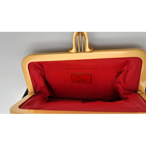 483 - A Christian Louboutin Ruffled Purse. Gilded hardware with high heel clasp. Red textile interior. 21c... 