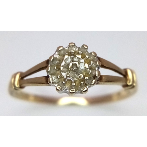 698 - A 9K YELLOW GOLD DIAMOND SET CLUSTER RING. 1.6G. SIZE R. SC5022.