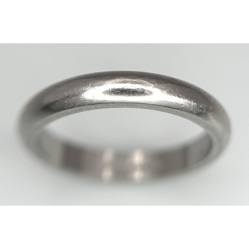 702 - A 950 Platinum Band Ring. 3mm width. Size J. 4.87g weight.