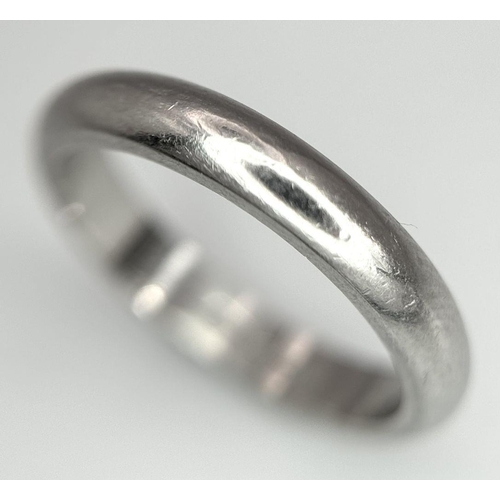 702 - A 950 Platinum Band Ring. 3mm width. Size J. 4.87g weight.