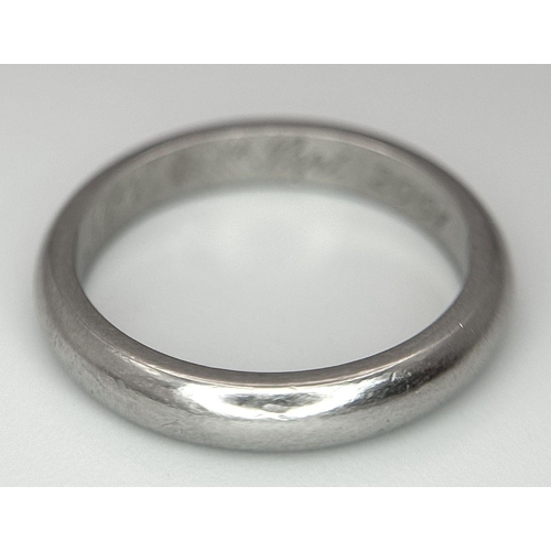 702 - A 950 Platinum Band Ring. 3mm width. Size J. 4.87g weight.