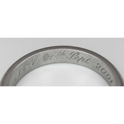 702 - A 950 Platinum Band Ring. 3mm width. Size J. 4.87g weight.