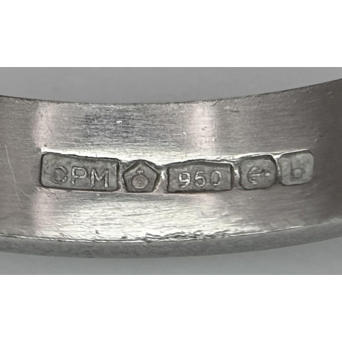 702 - A 950 Platinum Band Ring. 3mm width. Size J. 4.87g weight.