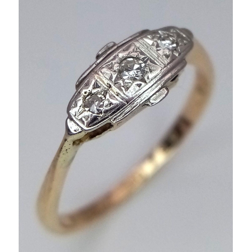 712 - A 9K YELLOW GOLD AND PLATINUM VINTAGE DIAMOND RING. 1.7G. SIZE M. SC5027