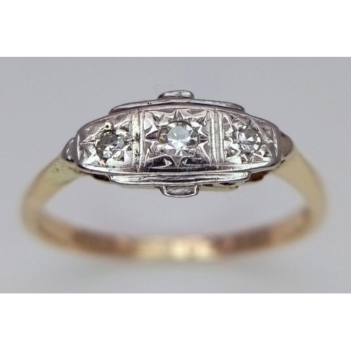 712 - A 9K YELLOW GOLD AND PLATINUM VINTAGE DIAMOND RING. 1.7G. SIZE M. SC5027