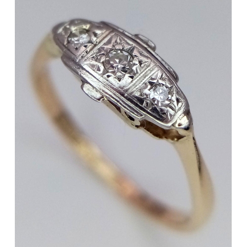 712 - A 9K YELLOW GOLD AND PLATINUM VINTAGE DIAMOND RING. 1.7G. SIZE M. SC5027