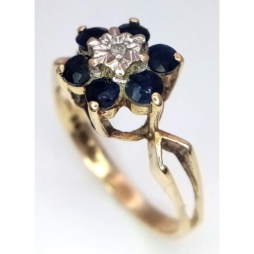 733 - A 9K YELLOW GOLD DIAMOND AND SAPPHIRE RING. 1.6G. SIZE J. SC5039