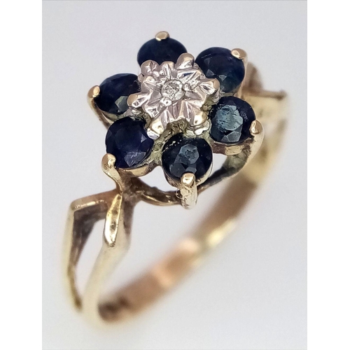 733 - A 9K YELLOW GOLD DIAMOND AND SAPPHIRE RING. 1.6G. SIZE J. SC5039