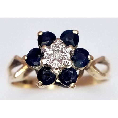 733 - A 9K YELLOW GOLD DIAMOND AND SAPPHIRE RING. 1.6G. SIZE J. SC5039