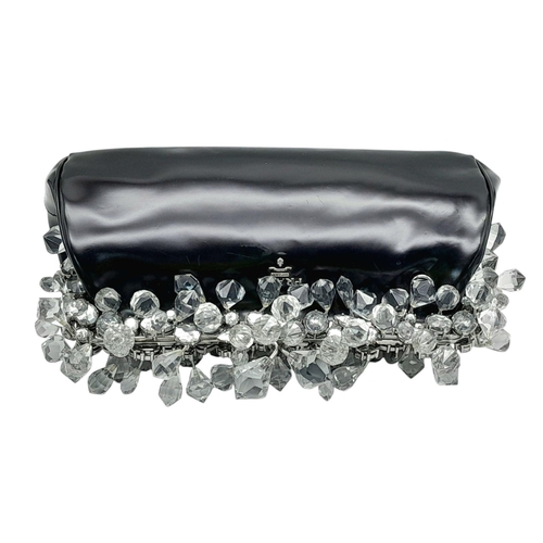 74 - A Prada Black Patent Leather Crystal Embellished Clutch Bag. Patent leather exterior adorned with cr... 