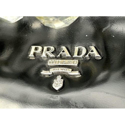 74 - A Prada Black Patent Leather Crystal Embellished Clutch Bag. Patent leather exterior adorned with cr... 