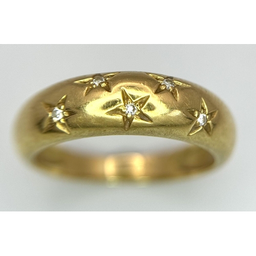 863 - An 18K Yellow Gold Five Diamond Gypsy Set Ring. Size L. 3.82g total weight.