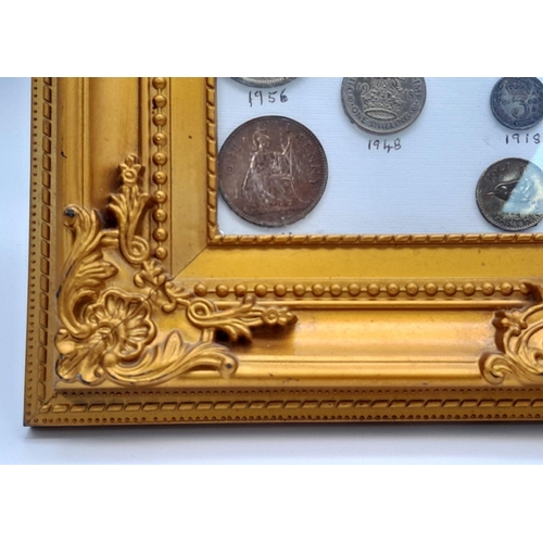 947 - A Framed Small Coin and Note Collection - Includes a mint ten shilling note. In frame - 28cm x 34cm.