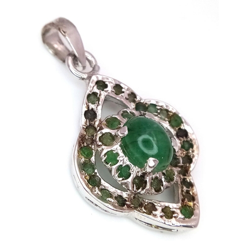 1662 - A Fancy Emerald Silver Tone Pendant. HV 2345