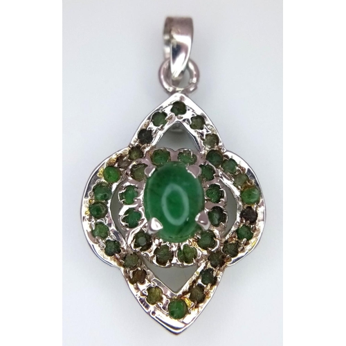 1662 - A Fancy Emerald Silver Tone Pendant. HV 2345