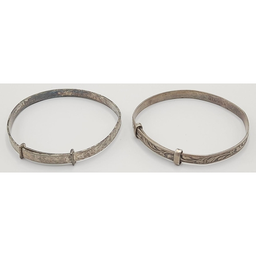 1644 - 2X vintage sterling silver adjustable bangles with ornate engravings. Total weight 10.3G. Please see... 